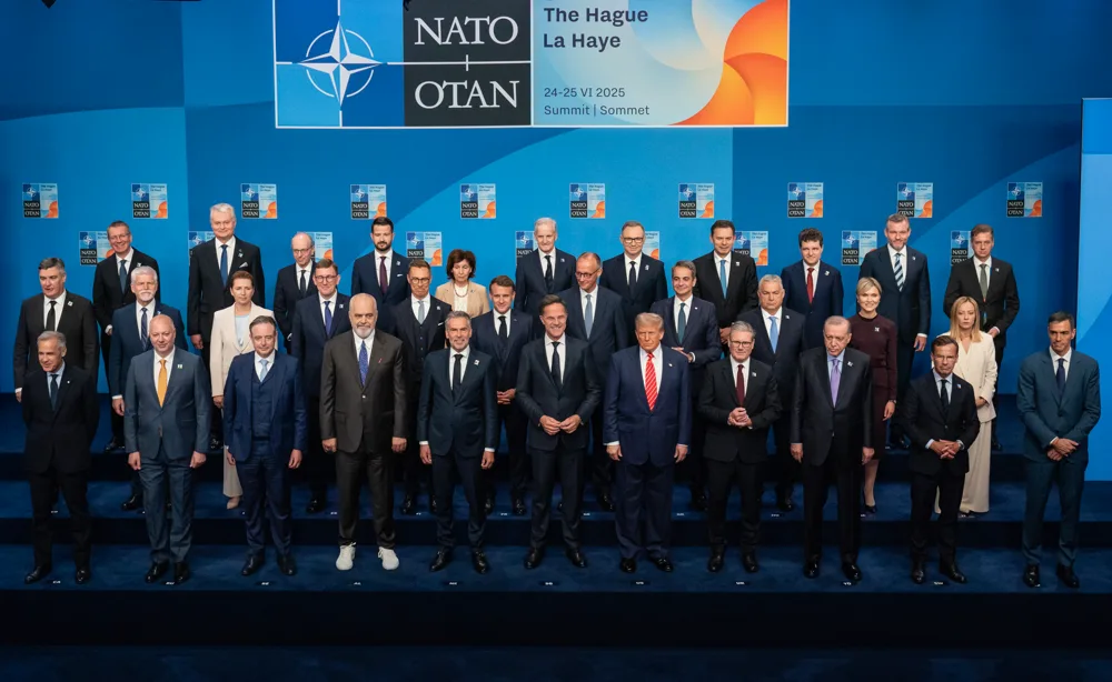 what is nato - Group of world leaders at a NATO summit.
